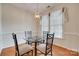 Cozy dining area featuring a modern chandelier and large windows, perfect for enjoying meals with Gathering at 422 Garnet Ct, Fort Mill, SC 29708