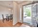 Bright foyer with hardwood floors, dining area, and clear view of the front porch, providing a warm welcome at 422 Garnet Ct, Fort Mill, SC 29708