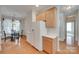 Open kitchen showcasing a refrigerator and dining area, perfect for casual meals and conversations with Gathering at 422 Garnet Ct, Fort Mill, SC 29708
