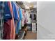 Walk-in closet with ample hanging space and shelving units for storage and organization of clothing and accessories at 4960 York Hwy, Rock Hill, SC 29732