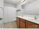 Well-lit bathroom featuring a double sink vanity and shower with neutral tones, creating a clean and functional space at 5308 Lambert Ct, Waxhaw, NC 28173