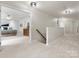 Bright hallway area with carpeted floors and a glimpse into a bedroom, creating a cozy and inviting atmosphere at 5308 Lambert Ct, Waxhaw, NC 28173