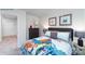 This bedroom has a comfortable bed with dinosaur-themed covers and playful dinosaur artwork at 581 E Sparkleberry St, Chester, SC 29706