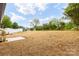 A vast backyard featuring freshly installed sod and steps leading to the back door at 605 Stirewalt Rd, China Grove, NC 28023