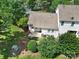Aerial view of the backyard featuring a patio, lawn, tasteful landscaping, and the home's HVAC unit at 614 Stone Village Dr, Fort Mill, SC 29708