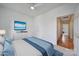 Bright bedroom featuring a ceiling fan, large dresser with TV, and ensuite bathroom access at 614 Stone Village Dr, Fort Mill, SC 29708