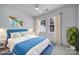 Bedroom with a ceiling fan, windows, neutral walls, and a comfy bed setup at 614 Stone Village Dr, Fort Mill, SC 29708