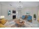 Bright living room featuring a fireplace, neutral walls, and ample natural light at 614 Stone Village Dr, Fort Mill, SC 29708