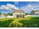 Expansive, well-manicured backyard with full privacy fence and patio at 6314 Bluffton Ln, Midland, NC 28107