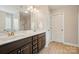 Bathroom featuring double sinks, vanity, and modern fixtures at 6314 Bluffton Ln, Midland, NC 28107