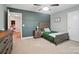 Bedroom with board and batten accent wall and neutral decor at 6314 Bluffton Ln, Midland, NC 28107