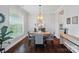 Stylish dining room bathed in natural light with modern furnishings and elegant décor at 6314 Bluffton Ln, Midland, NC 28107