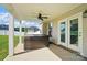 Relaxing covered patio featuring a private hot tub, perfect for unwinding and enjoying the outdoors at 6314 Bluffton Ln, Midland, NC 28107