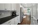 Well-appointed kitchen with granite counters, stainless steel appliances and ample cabinet space at 6314 Bluffton Ln, Midland, NC 28107