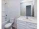 Standard bathroom featuring a tub, toilet, and vanity with sink at 6717 Ware Rd, Charlotte, NC 28212