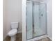 Clean bathroom with a glass-enclosed shower and modern toilet at 6717 Ware Rd, Charlotte, NC 28212