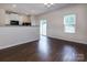 Well-lit kitchen area featuring modern appliances and sliding glass doors at 6717 Ware Rd, Charlotte, NC 28212