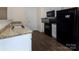 Modern kitchen with granite countertops and stainless steel appliances at 6717 Ware Rd, Charlotte, NC 28212