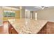 Expansive island featuring granite countertop at 7020 Cedar Ridge Ct, Mount Holly, NC 28120