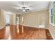 Bright, open living room with hardwood floors and neutral paint at 7020 Cedar Ridge Ct, Mount Holly, NC 28120