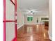Spacious open-concept living room with gleaming hardwood floors at 7020 Cedar Ridge Ct, Mount Holly, NC 28120