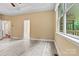 Main bedroom showcasing natural light, neutral colored walls and laminate floors at 7020 Cedar Ridge Ct, Mount Holly, NC 28120