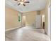 Spacious main bedroom features laminate flooring, ceiling fan, and natural lighting at 7020 Cedar Ridge Ct, Mount Holly, NC 28120