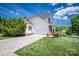 Traditional home with a two car garage, brick accents, and a landscaped front yard at 7245 Willow Brook Ct, Denver, NC 28037