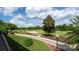 Picturesque golf course featuring manicured greens, a sand trap, and landscaping at 7245 Willow Brook Ct, Denver, NC 28037