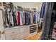 Spacious walk-in closet with ample storage space, shelving, drawers, and hanging rods at 7245 Willow Brook Ct, Denver, NC 28037