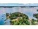 Stunning aerial view of lakefront property showcasing the expansive waterfront and surrounding greenery at 8218 Bright Water Ln, Denver, NC 28037