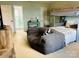 Cozy bedroom features a bunk bed, comfy chair, and an ensuite bathroom entrance at 8218 Bright Water Ln, Denver, NC 28037