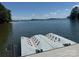 Boat dock with jet ski floating platform and stunning water views at 8218 Bright Water Ln, Denver, NC 28037