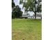 Expansive backyard with a well-maintained lawn and a classic two-story home at 8218 Bright Water Ln, Denver, NC 28037