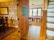 Interior view from foyer with staircase with a glimpse of dining room and lake views at 8218 Bright Water Ln, Denver, NC 28037