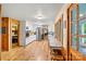 Spacious kitchen featuring wooden floors, stainless steel appliances, and ample storage space at 8218 Bright Water Ln, Denver, NC 28037