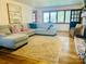 Inviting living room featuring comfortable seating, a large window overlooking the lake, and a cozy atmosphere at 8218 Bright Water Ln, Denver, NC 28037