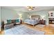Cozy main bedroom with a comfortable bed, ample natural light, and a relaxing atmosphere, perfect for rest at 8218 Bright Water Ln, Denver, NC 28037