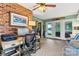 Bright office space with access to outdoor space features a desk area, ceiling fan, and nice decor at 8218 Bright Water Ln, Denver, NC 28037