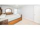 Neutral bedroom featuring natural wood furniture, natural light, and clean design at 9026 Raven Top Dr, Mint Hill, NC 28227