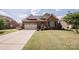 Charming single-Gathering home boasts manicured lawn and a two-car garage, creating an inviting curb appeal at 9026 Raven Top Dr, Mint Hill, NC 28227
