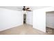 Bedroom featuring carpeted floors, neutral walls, and ceiling fan at 9614 Springholm Dr, Charlotte, NC 28278