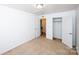 Bedroom featuring neutral walls, carpeted floors, and closet at 9614 Springholm Dr, Charlotte, NC 28278