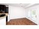 Dining area with hardwood floors and access to a patio or outdoor space at 9614 Springholm Dr, Charlotte, NC 28278