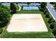 Aerial view of community volleyball and basketball courts with well-kept landscaping at 9614 Springholm Dr, Charlotte, NC 28278