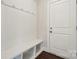 Functional mudroom with a bench, storage cubbies, and coat hooks for organization at 9944 Manor Vista Trl, Kannapolis, NC 28027