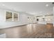 Spacious open floorplan combining the living area and modern kitchen with a center island at 9956 Manor Vista Trl, Kannapolis, NC 28027