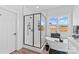 This bathroom features a glass-enclosed shower, soaking tub, and a scenic view at Lot 101 Coppergate Dr, Salisbury, NC 28147