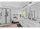 Bright bathroom features a double vanity, modern fixtures, soaking tub, and a glass-enclosed shower at Lot 101 Coppergate Dr, Salisbury, NC 28147