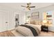 The bedroom features a ceiling fan, a spacious closet, and an ensuite bathroom at Lot 101 Coppergate Dr, Salisbury, NC 28147
